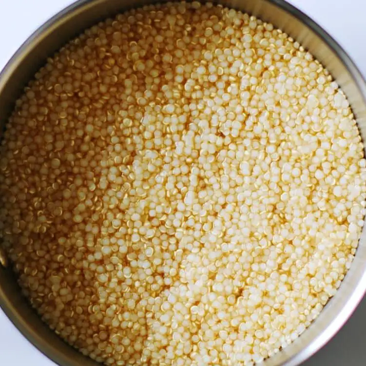 Cooking quinoa in a saucepan on the stove