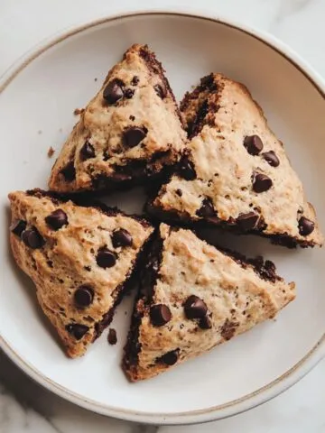 Freshly baked homemade chocolate scones recipe on a white kitchen counter