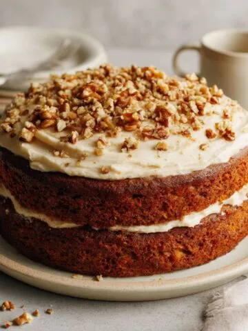 Homemade carrot cake with walnuts recipe freshly baked and frosted