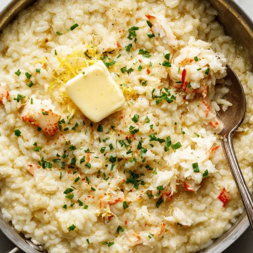 Folding crab meat, butter, and lemon zest into finished risotto