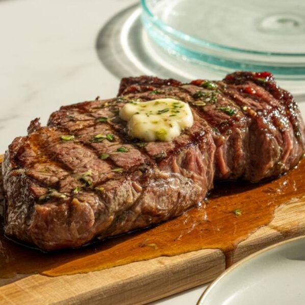 Garlic butter steak resting before serving