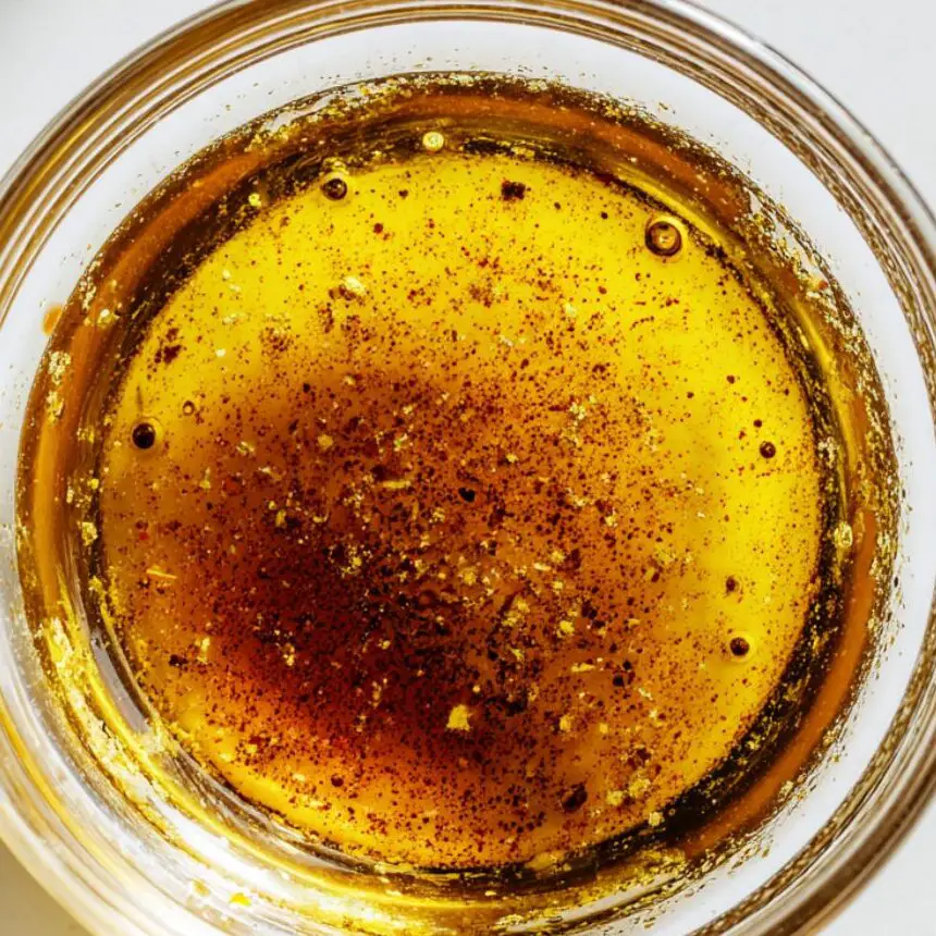 Homemade balsamic vinaigrette freshly whisked in a bowl

