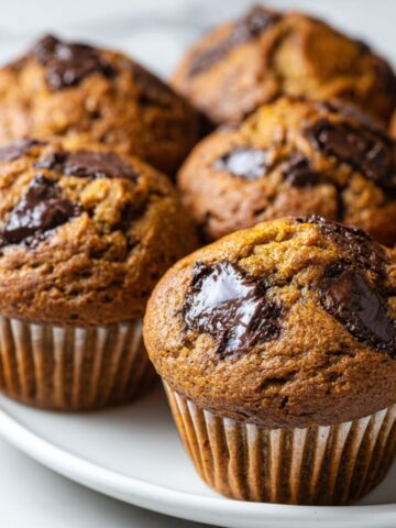 Freshly baked mocha muffins recipe cooling on a kitchen counter