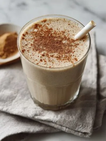 Creamy Vanilla Chai Protein Shake Recipe served in a glass on white kitchen counter