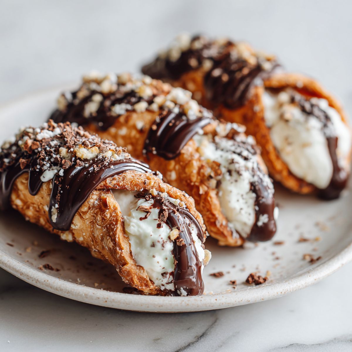 Homemade chocolate dipped cannoli recipe with ricotta filling on a white kitchen counter, rustic and imperfect for a real homemade look.
