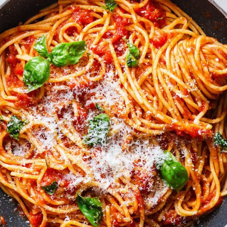 Spaghetti tossed with fresh tomato sauce, basil, and Parmesan.