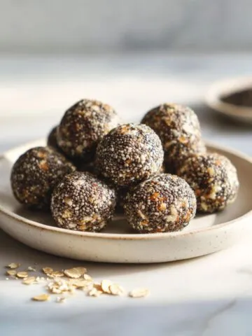 “Homemade chia seed energy bites recipe on a white marble counter, shot from above with natural light for a real kitchen feel.”